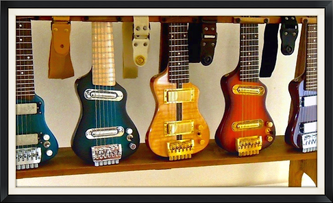small electric guitars for travel and practice. Smallest travel guitar